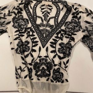 Honey Punch bodysuit in size XS. Deep V neck.